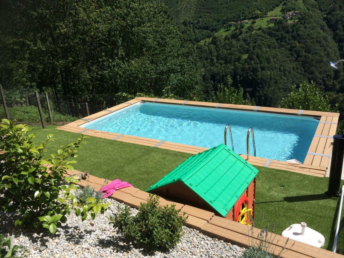 Chalet con Piscina Garzeno Esterno foto